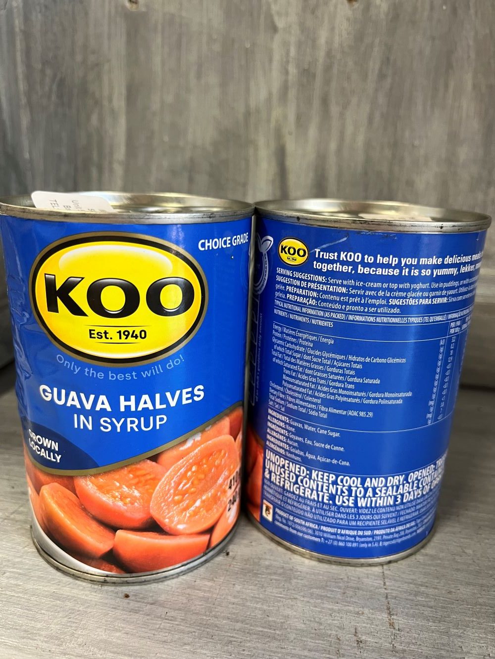A tin of KOO Guava Halves, showcasing the label with vibrant guava halves, a popular South African tinned fruit product.